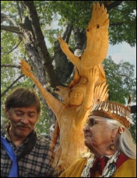 The Sculpture and the Tree It Came From. Photo.