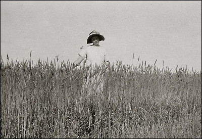 1916: Grandma Maude in a Wheat Field. Photo.
